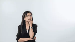 A girl thinking DIY vs. Professional Painting Services